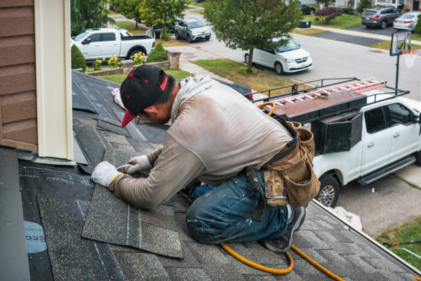Professional Roof Repair technician working in Alburtis, PA